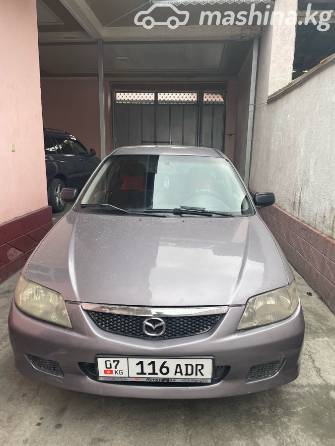 Mazda 323 VI (BJ) Рестайлинг 1.6 MT