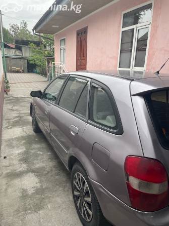 Mazda 323 VI (BJ) Рестайлинг 1.6 MT