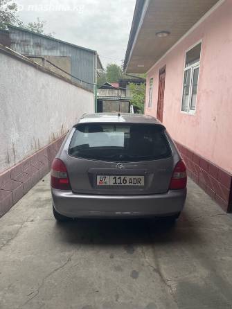 Mazda 323 VI (BJ) Рестайлинг 1.6 MT