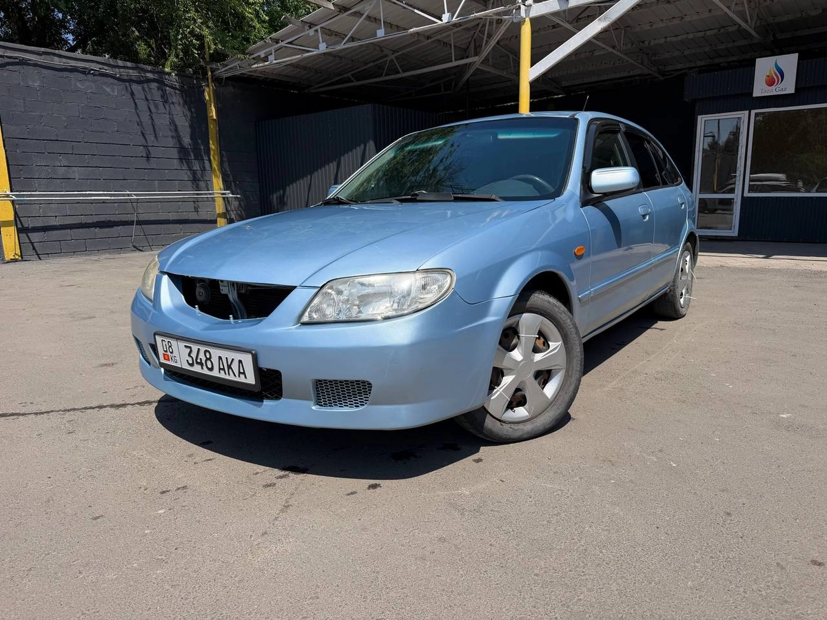 Mazda 323 VI (BJ) Рестайлинг 1.6 AT