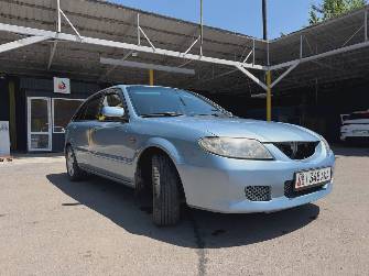 Mazda 323 VI (BJ) Рестайлинг 1.6 AT