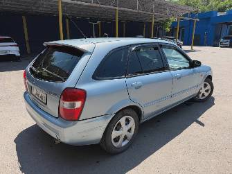 Mazda 323 VI (BJ) Рестайлинг 1.6 AT