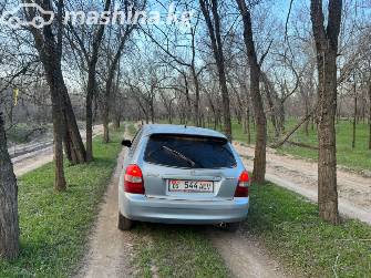 Mazda 323 VI (BJ) Рестайлинг 1.6 MT