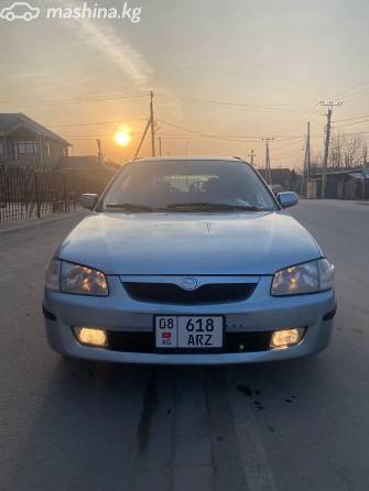 Mazda 323 VI (BJ) Рестайлинг 1.6 MT