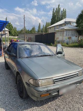 Toyota Carina V (T170) 1.6 MT