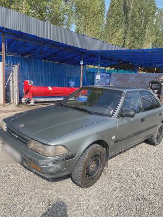 Toyota Carina V (T170) 1.6 MT