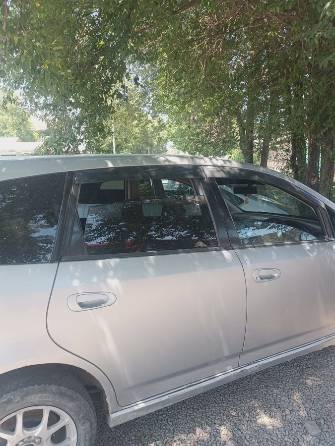 Honda Stream I Рестайлинг 1.7 AT