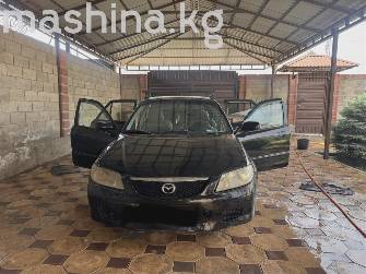 Mazda 323 VI (BJ) Рестайлинг 1.6 MT