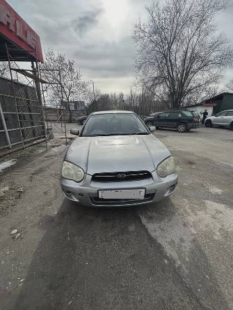 Subaru Impreza II Рестайлинг 1 1.5 AT