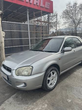 Subaru Impreza II Рестайлинг 1 1.5 AT