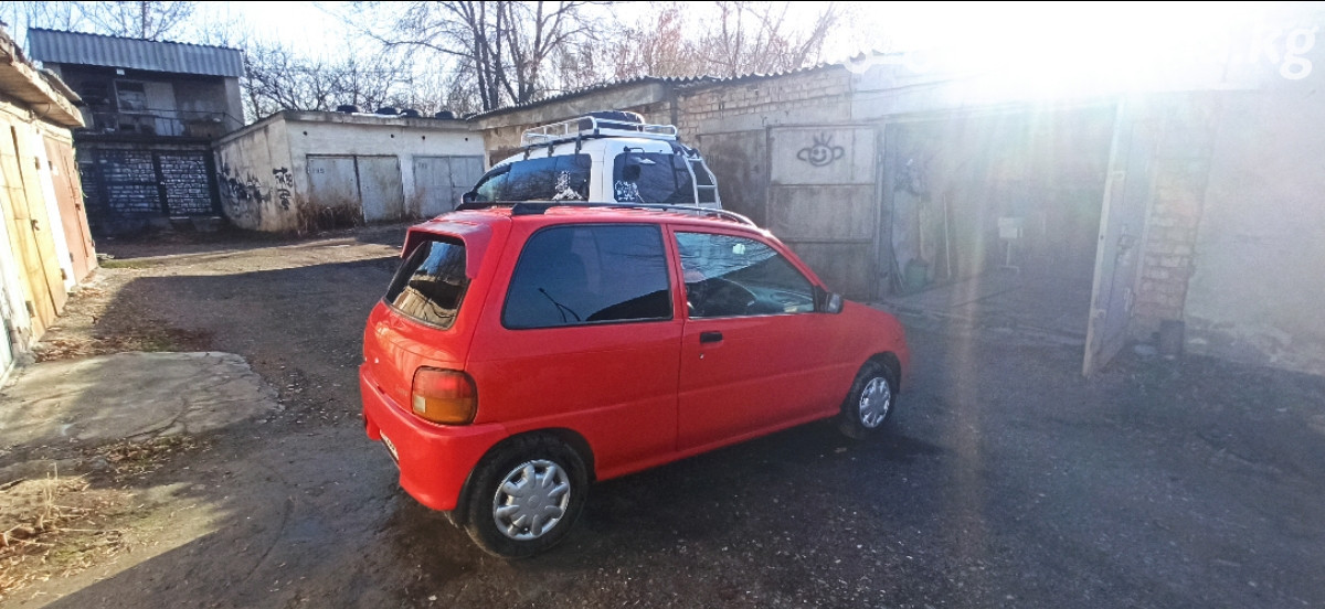 Открыть фото Daihatsu Cuore IV (L500) 0.9 MT