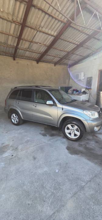 Toyota RAV4 II (XA20) Рестайлинг 2.4 AT 4WD