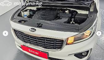 Kia Carnival III 3.3 AT