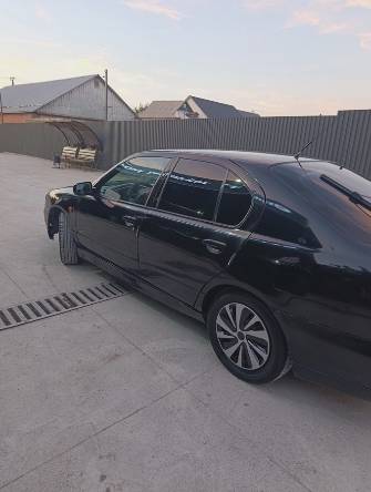 Nissan Primera II (P11) Рестайлинг 2.0 MT