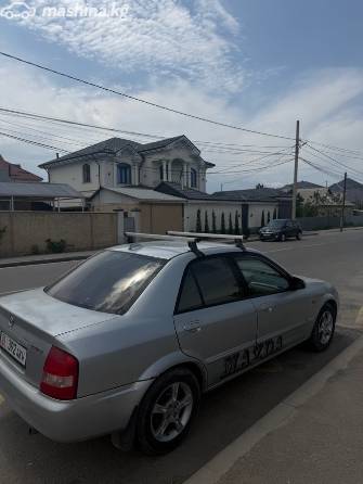 Mazda 323 VI (BJ) Рестайлинг 1.6 MT