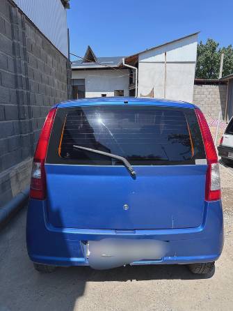 Daihatsu Cuore VI (L251) 1.0 MT