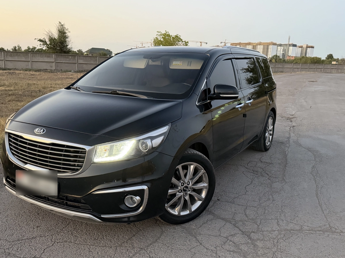 Открыть фото Kia Carnival III 2.2d AT