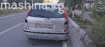 Nissan Almera Tino 1.8 MT