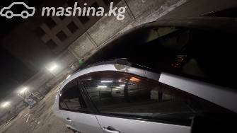 Nissan Primera III (P12) 1.8 MT