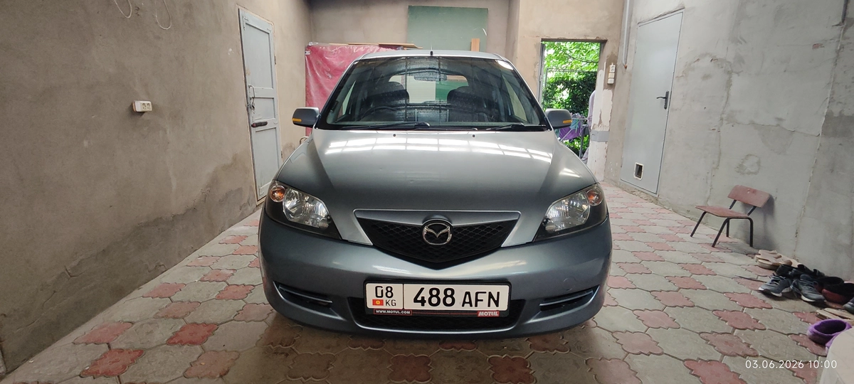 Открыть фото Mazda Demio II (DY) 1.3 AT