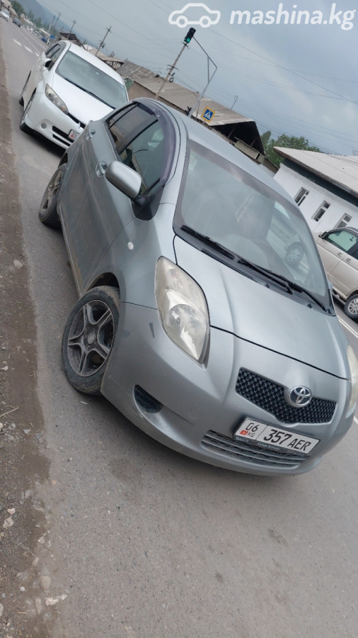 Открыть фото Toyota Yaris II 1.3 AMT