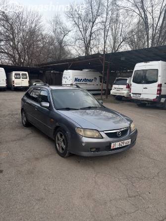 Mazda 323 VI (BJ) Рестайлинг 1.6 MT