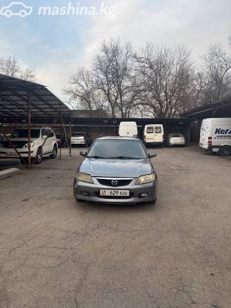 Mazda 323 VI (BJ) Рестайлинг 1.6 MT