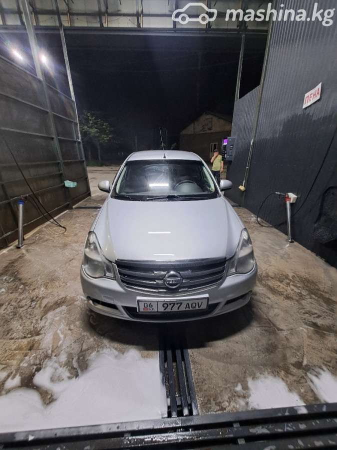 Nissan Almera III (G15) 1.6 MT