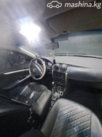 Nissan Almera III (G15) 1.6 MT