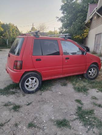Daihatsu Cuore III (L200) 0.9 MT