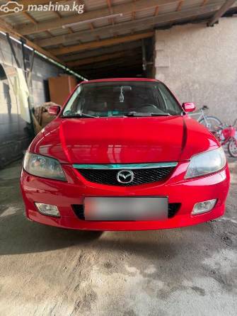 Mazda 323 VI (BJ) Рестайлинг 1.6 MT