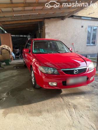 Mazda 323 VI (BJ) Рестайлинг 1.6 MT