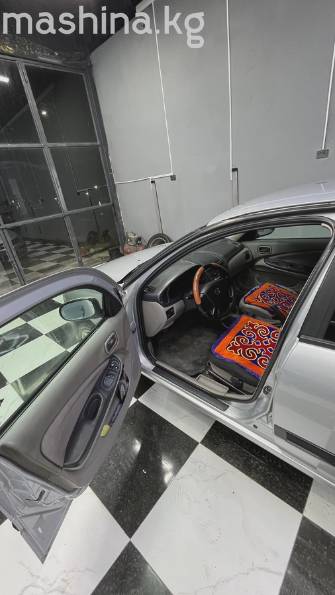 Nissan Almera II (N16) 1.5 MT