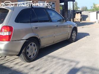Mazda 323 VI (BJ) Рестайлинг 1.5 MT