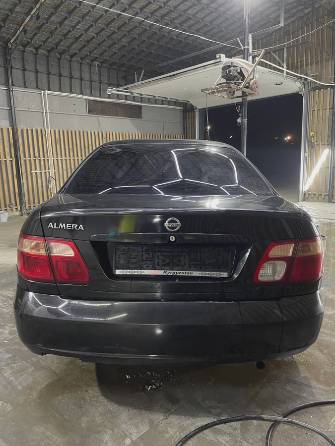 Nissan Almera II (N16) Рестайлинг 1.5 MT