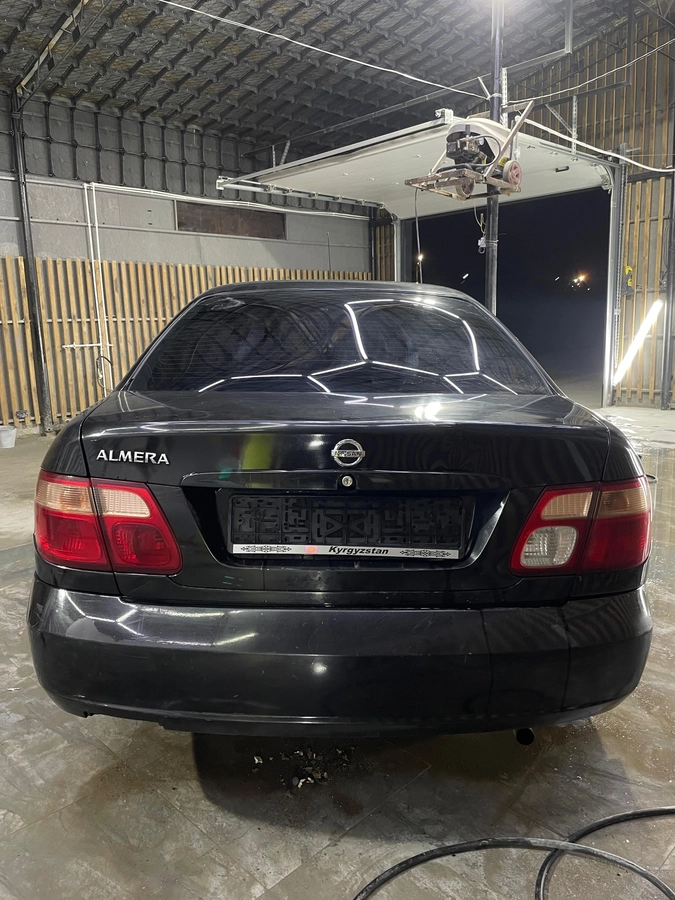Nissan Almera II (N16) Рестайлинг 1.5 MT