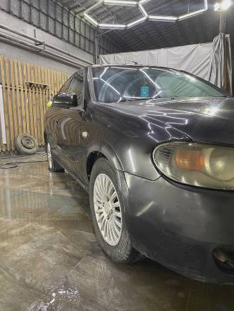 Nissan Almera II (N16) Рестайлинг 1.5 MT
