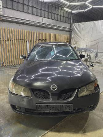 Nissan Almera II (N16) Рестайлинг 1.5 MT