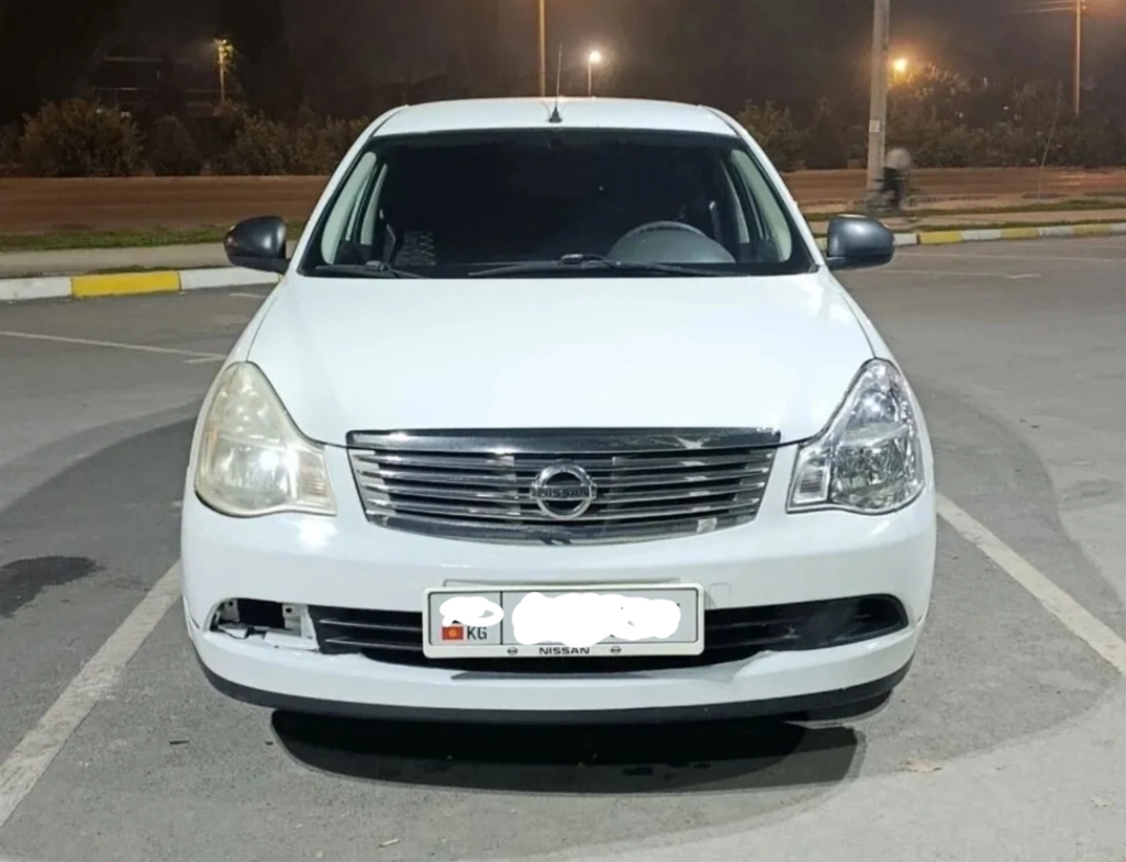 Nissan Almera III (G15) 1.6 MT