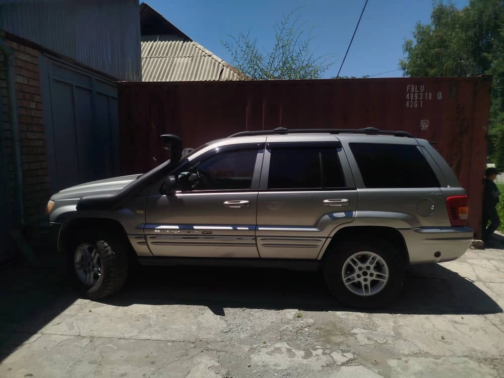 Открыть фото Jeep Grand Cherokee II (WJ) 4.0 AT 4WD