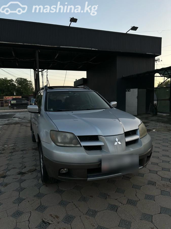 Открыть фото Mitsubishi Outlander I 2.0 MT 4WD