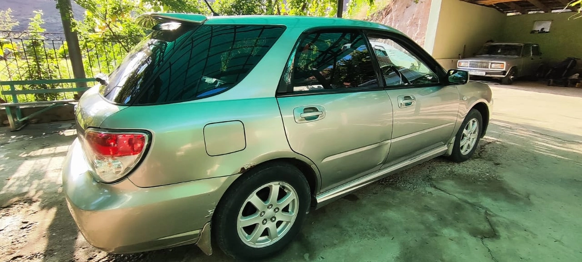 Subaru Impreza II Рестайлинг 2 1.5 AT