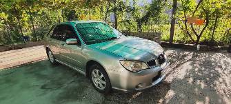 Subaru Impreza II Рестайлинг 2 1.5 AT