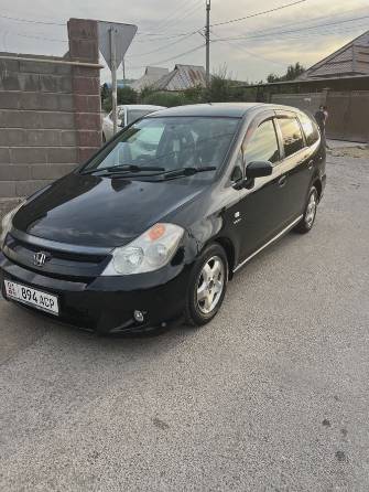 Honda Stream I Рестайлинг 1.7 AT