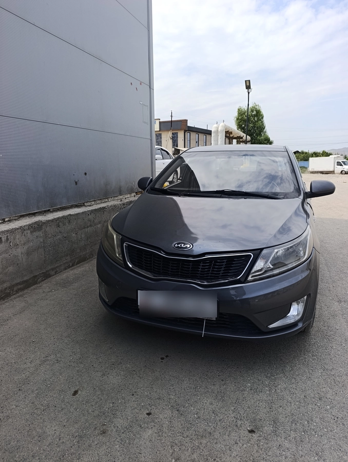 Kia Rio III 1.4 MT