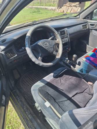 Toyota Carina VI (T190) E 1.8 MT