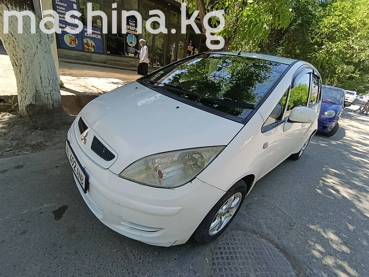 Открыть фото Mitsubishi Colt VI 1.5 CVT