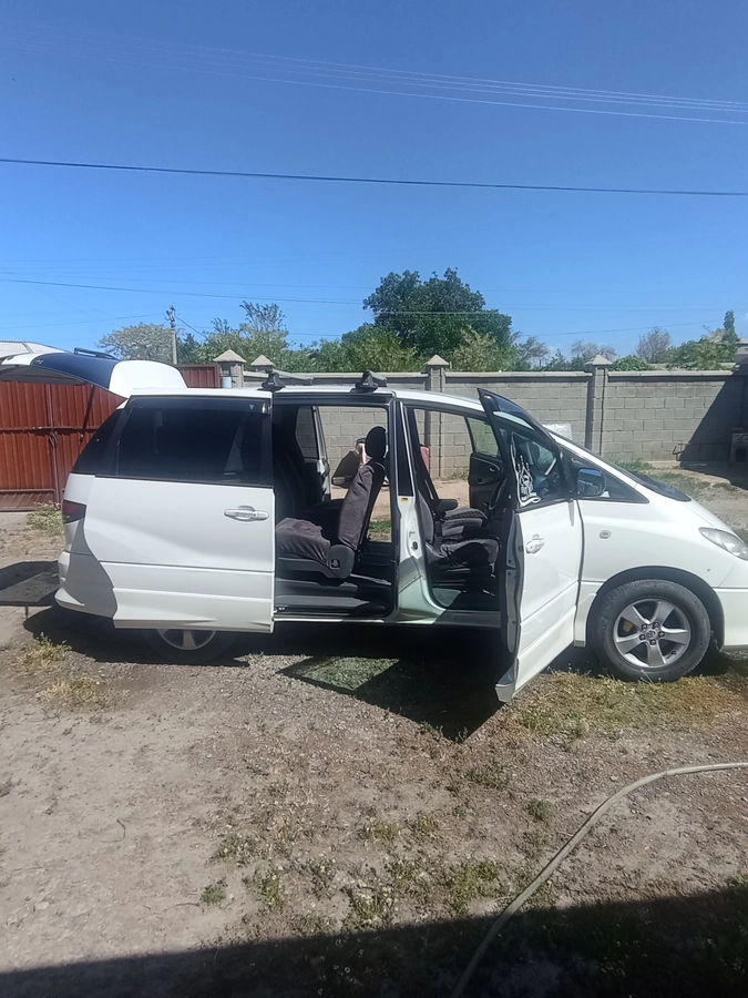 Открыть фото Toyota Estima II Рестайлинг 2.4hyb CVT 4WD