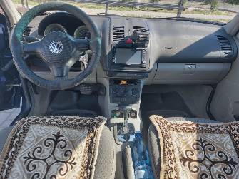 Volkswagen Polo III Рестайлинг 1.4 AT