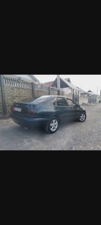 Toyota Carina VI (T190) E 1.8 MT